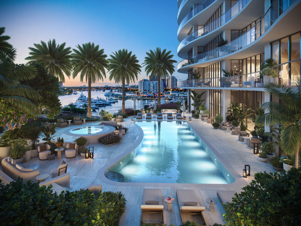 Resort-style pool with palm-lined deck and private cabanas